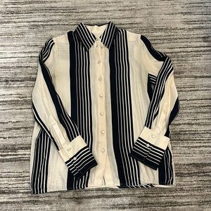 COS cream and black blouse